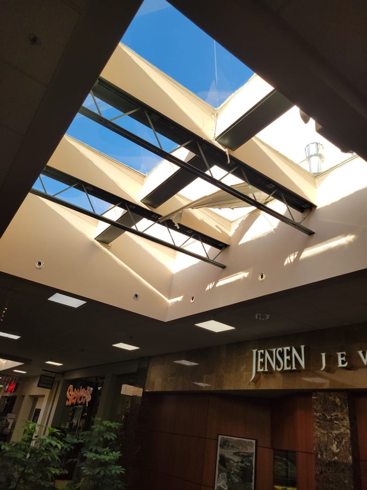 Debris Crashes Through Skylight of Holiday Village Mall